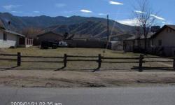Very nice level, buildable lot. Front is split-rail fenced. walking distance to shopping center and school. Minutes from the lake and mountain views all around. Price reduced from original listing.Listing originally posted at http
