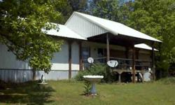 It features a 1 acre lot with large shade trees. This home is just minutes from the national forest.It has a large covered Deck and a nice outbuilding call for your showing today.
Listing originally posted at http
