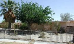 Excellent potential is available with this fixer. Basic 3 BR /2Ba stucco home on fenced in lot. Desert landscaping with a variety of plants & trees. This is a corporate owned property, sold as-is. For special financing and incentives, Seller requests