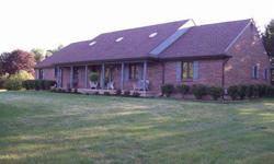 Custom built 1 level brick home situated on 1.67 acre country lot features 5 beds with first level master suite, office or sixth bedroom, 3 bathrooms, 3917 sq-ft (pcr) plus 86 x 36 unfinished basement, and garage access from unit for 3 cars.
Chris Monnin