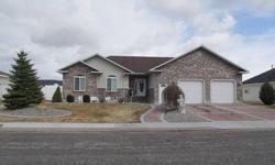 Beautifully finished home. Kitchen features granite counter tops & oak cabinets. Great room has vaulted ceilings and a gas fireplace. Master Bedroom has a walk-in closet and master bath with large jetted tub and separate shower. Hardwood floors in kitchen