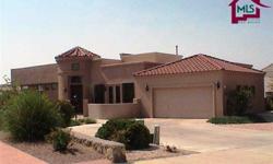 This home has it all! Contemporary elegance on the 15th fairway with unobstructed views of the Organ Mountains. The well-designed great room with fireplace is perfect for entertaining. The formal dining room could also be used as an office/study. There