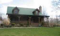 SHORT SALE**Charming custom hand-hewn log home set back off the road. Gorgeous 3+ acres of property with private stocked pond. Walking distance to state parks,Appalachian Trail & ski resorts nearby. Living room w/cathedral beamed ceiling & wood burning