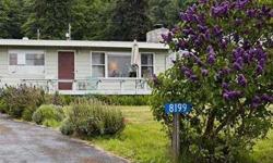 Charming southwest view cottage in Sandy Hook Yacht Club Estates with wonderful views of Cultus Bay, Scatchett Head, the Shipping Lane traffic and the snow capped Olympic Mountains. Enjoy year round sunsets and forever changing sea and skyscapes. Large