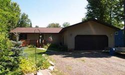 Beautiful ranch style home on Lake Superior! There is an open floor plan with tile floors welcoming you and transitioning to wood into the living area. The views from the sliding glass door in the living room will immediately grab your attention and lead