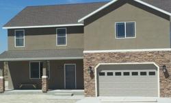 Beautiful new construction in Spring Creek. 5 bed 3 bath 2800 Sq ft. Granite, tile and all appliances. Stucco exterior. Home is framed and ready for you to pick your interior colors. Call Vicki Lloyd Century 21 Gold West Realty 775-934-3605 for a personal