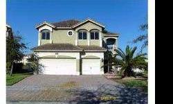 AMAZING REO PROPERTY FOR SALE. WITH 4 BEDROOMS AND 3.5 BATHROOMS, LOCATED IN MONARCH LAKES OF MIRAMAR. PRICED AT $294,900. Bank Owned - Lake View . Ceramic tiled floors throughout 1st level. Large volume ceiling in the living room. Formal dining.