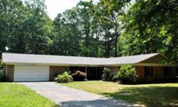 ...this spacious rambler offers over 2016 sq ft of country living... nestled on 1.37 wooded acres on quiet street in an established neighborhood. This well maintained home offers 4 bedrooms, 2 baths, formal living and dining rooms, family room and