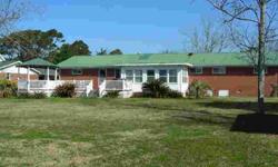 WATERFRONT - MOREHEAD CITY 5 BEDROOM, 3 BATH (APPROX 2400 SQ. FT) BRICK RANCH STYLE HOME SITUATED ON LARGE LOT ON CALICO CREEK. NICELY LANDSCAPED YARD. OTHER FEATURES INCLUDE FIREPLACE, SUNROOM LARGE DOCK, LARGE GAZEBO/SUNDECK OVERLOOKING WATER, METAL