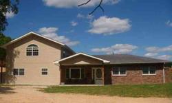 Split level partial earth berm home on 64 acres m/l in Shannon County, Missouri. Boasts of 4 Bedrooms, 3 and half baths, very nice kitchen with all appliances, tile flooring, hickory cabinets, mud room, large living room, 8 x 28 cedar deck, Hardy Wood
