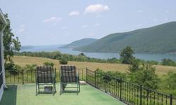 FINGER LAKES REGION SUPERIOR BUILDING SITE WITH INCREDIBLE VIEW OF CANANDAIGUA LAKE ----- This quality 6+ acre property is located high above the 15 mile long Canandaigua Lake just north of the quaint Village of Naples and only 20 minutes south from the