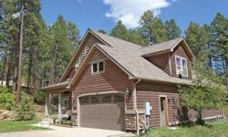 Excellent value for a beautiful home custom built by Red Rock Homes. It's nestled in the pines, yet still flooded with natural light. With 3 bedrooms plus a bonus room currently used as a media room (and at one point as a formal dining room), 2.5
