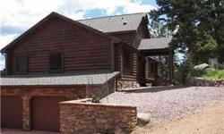 Incredible Views Pikes Peak & Mueller State Park~ Custom Log Home ~ Gourmet Kitchen (Lg Pantry, Granite Counters, Island/Breakfast Bar, Gas Cooktop/Electric Oven, Stainless Appliances) ~ Dining Area ~ Great Room w/ vaulted T&G Aspen Ceiling ~ Artisan Gas