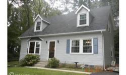 Lovely cape cod in Prince Frederick, MD on almost 3 acres. 3 BR's, 2 full baths. Granite counters, S/S appliances, almost new windows, pellet stove. This one even has the white picket fence! Detached 2 car garage/workshop with heat and water.