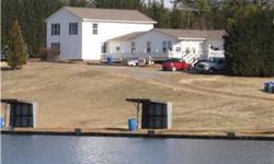 Great home on 17 acres with income producing fishing lakes, grill, bait shop, and rental mobile home. This one could pay for itself! A 5 acre engineered lake measuring over 600' long & 300' wide holding approx. 18 million gallons. Sloped sides go to a