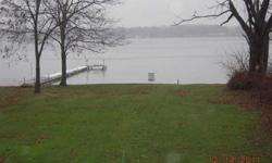55' lake frontage. Sloping lot to lake for daylight or walk-out basement.Listing originally posted at http