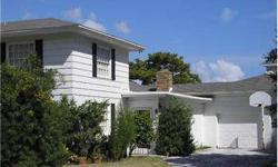 Beautiful Beachside 4 bedroom 3 1/2 bath home on a large corner lot in an older neighborhood in the city of Ormond Beach. Ceramic Tile kitchen floors and gorgeous hardwwd floors in most of the spacious living area. 2 upstairs bedrooms each have their own
