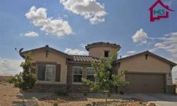 The Tuscan exterior of 4497 Ojo Caliente Circle has the look of old world charm. This home has all the upgrades that the builder had to offer. With 4 bedrooms and 2 1/2 baths this home is perfect for your family. As you walk in through the open courtyard
