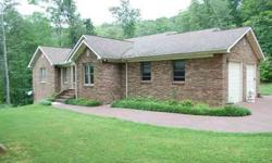 #2347 - Middlesboro, Vista Venado, Middlesboro, KY - TUCKED IN THE MOUNTAINS OF KENTUCKY is this beautiful 2 -level brick home nestling in the trees and sitting on 4.1 acres bordering the National Park. This home has approx. 5,800 SF; 4 bedrooms, 4.5