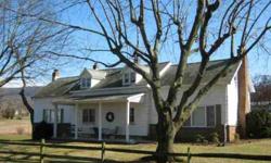REDUCED! Farmette on over 5 Acres with STREAM! Bring your horses and your family....this has it all! Charming home with attached 1 BR apartment (could be office or studio or 5th BR), New kitchen, Restored log beams and walls, 2 BIG family rooms w/ FPs,