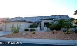 Sweeping Views! You will enjoy sitting on the inviting extended patio of this home, watching the golfers go by, along with the incredible Arizona mountain sunsets on the 16th fairway of the Desert Springs Golf Course in the lovely Surprise, AZ adult