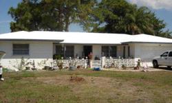 older florida style home,,gravel roof,2 bedroom,2 bath,2 car garage,, ..lot size 100ft seawall x 125 deep....,,this house is being sold by owner/realitor,has lived in home for over 20yrs,,. mins..away from direct access to stump pass/ gulf of