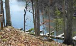 Ridge Pt at North Shore!Beautiful waterfront lot w/boat slip & boat storage unit is situated just off the main channel of Pickwick Lake in a spacious deep cove.Exclusive gated subd offers many amenities