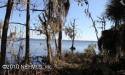 RIVERFRONT LOT with creek access as well. Build dock for deep water access and another dock on Creek for your Jet Ski and Small Boats. 80' Access from road. Ready to build your dream home right on the Prestigious St. Johns River in Fleming Island area.