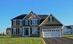 Spacious colonial at Grand Point Crossing. 4 bdrms, 2.5 baths, open foyer, hdwd flooring, separate dining room, library/den, granite counter tops, custom cabinets, laundry room on the upper level, master bedroom w/walk-in closet & full master bath,