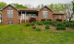 THIS ONE OF KIND PROPERTY FEATURES OVER 2 ACRES IN A QUIET SUBDIVISION THAT IS JUST OUTSIDE CITY LIMITS! UPDATES AND AMENITIES IN THIS CUSTOM BUILT ALL BRICK HOME TO INCLUDE