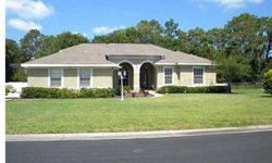 Custom executive home featuring 4 bedrooms, 3 baths and a 3 car garage with over 3600 square feet of living space. Located in the gated community of just 10 custom homes. This is Florida living at its best! Large open spacious rooms with coffered ceilings