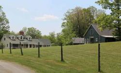 This large Cape sits in the heart of 20.5 private and serene acres. The dining room has granite tiled hearth and sits right off the eat-in kitchen. The living room has wide plank wood flooring and brick hearth. M. bedroom has cathedral ceiling, sitting