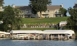 This Okoboji Woods condominium has a great view to the lake! Second floor unit with vaulted ceilings, sky lights and open floor plan overlooking the deck and outdoor pool area. 2 bedrooms and 2 bathrooms with Master Suite on lakeside. Single detached