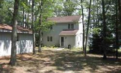 Terrific home on Duck Lake, just a short walk from the Interlochen Music Camp. The firm sandy beach is perfect for swimming and the bonus beach house has three rooms and lots of potential. Features include main floor master BR, good lake views from most
