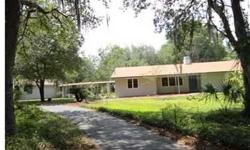 A great Retreat from the Hustle and Bustle of Tampa. Absolutely beautiful piece of property - 4.89 acres in Pasco County, a mere 40 minutes from downtown Tampa and as quiet and peaceful as if you were in the mountains of Georgia. If you work from home, it