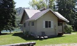 160 feet of frontage on the Pend Oreille River. Spectaculas panoramic view of wildlife viewing on the ridge and sidehills across the river. Dock with boat slip. Tastefully updated 2 bedroom and 2 bath home. Immaculated. Approx. 1.1 acres level treed