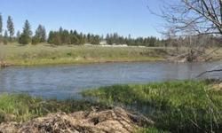 Build your new dream home on this beautiful Water Front property located on the Little Spokane River. Just shy of 3 flat acres that roll right into your very own 260 feet of water frontage. Located in the Mead school district with easy access off of
