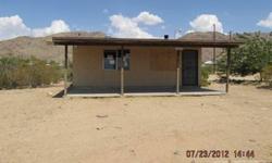 NIce little cabin on 5 acres. All electric. Does need some minor repairs, but really good price. View of the valley, mountains and desert. Come see and write your offer today. For special financing and incentives seller requests potential buyers to