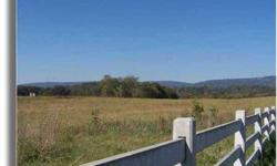 $29,000. AMAZING VIEW FROM THIS PIECE NO MATTER WHICH WAY YOU TURN Hard to find East Valley Farm property. City water is on East Valley. Owner can tap into it or choose to have a well. Underground utilities all the way up Walnut Grove. Split rail Fencing