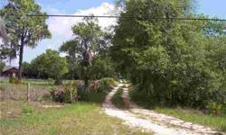 Wooded 1.55 acre home site ready for either a mobile home or single family home. Well and septic required.