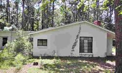 A beautiful parcel of land just out of town, large oaks and very large pines on it, the house needs some major work on the back, the front would make a nice cabin or camp house, plenty of wildlife in the area, Drive by today.Listing originally posted at