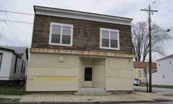 Triplex or multi unit with commercial space. Needs work. Corner lot. Sold as is. Must have proof of funds with offer. Verify schools, taxes, rooms, zoning.Listing originally posted at http