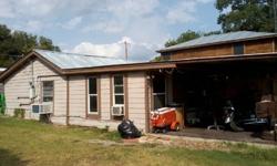 Neat two bed/one bath cabin in Club Lake community just outside of Stephenville. The cabin has hardwood floors, a nice back porch with a privacy fence that covers the porch. This is a great residence for college students or even an investment property to