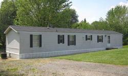 Located at 6807 Chimney Rock Corner, near the waters of scenic Rocky Fork Lake, this comfortable 3 bedroom, 2 full bath 1998 Fleetwood mobile home boasts vinyl siding, a private 16x16 rear deck and a newer shingle roof! Special features include an open