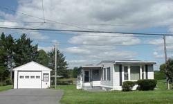 A pretty spot and a good sized lot make a nice setting for this older single wide manufactured home. The home features 2 bedrooms and a bath, plus open living room, dining area and kitchen. Recent improvements include Barrier windows and doors and a roof,