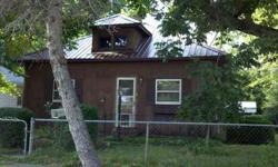 Attention Investors! This two bedroom, one bath home with a newer metal roof will not last long! A large living room, kitchen, spacious laundry, and sunporch offer plenty of space.
Listing originally posted at http