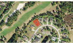 Great golf course lot on a pond with partial view of golf course. Located in White Marsh Subdivision close to shopping and Englewood beaches.