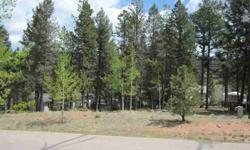 Gently sloping treed infill lot in quiet tucked away neighborhood. Flat building site. Already stacked with just enough fall for nice walkout. Tall pines & some aspen.Listing originally posted at http