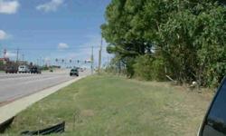 Heavily wooded land on North side of 71st Street across from Tulsa Hills Shopping Center, Perfect for Multi-family, office park, retail center, etc., mature trees make this a special development with charm, Mostly level topography, 30,000 cars per day.