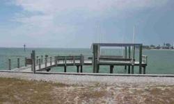 Fantastic Estate Building site with absolutely stunning 180 degrees of panoramic views. 143 feet on the water. Area of multi-million dollar homes. Magnificent neighborhood with incredible views of Pass-A-Grille Channel and the Gulf Of Mexico. Superior